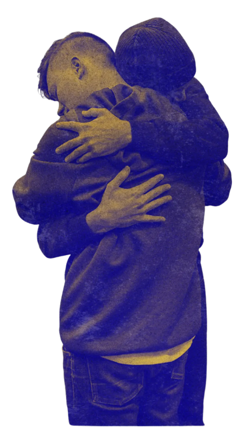 Two people embracing.